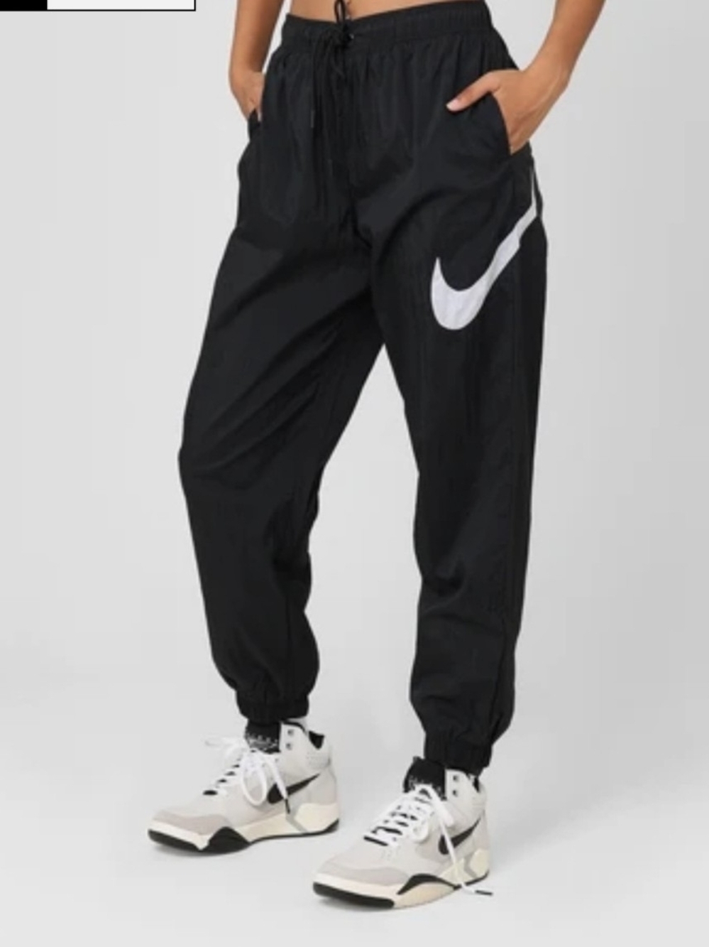 Nike Sportswear Essential Women's Mid-Rise Woven Pants  In Black
